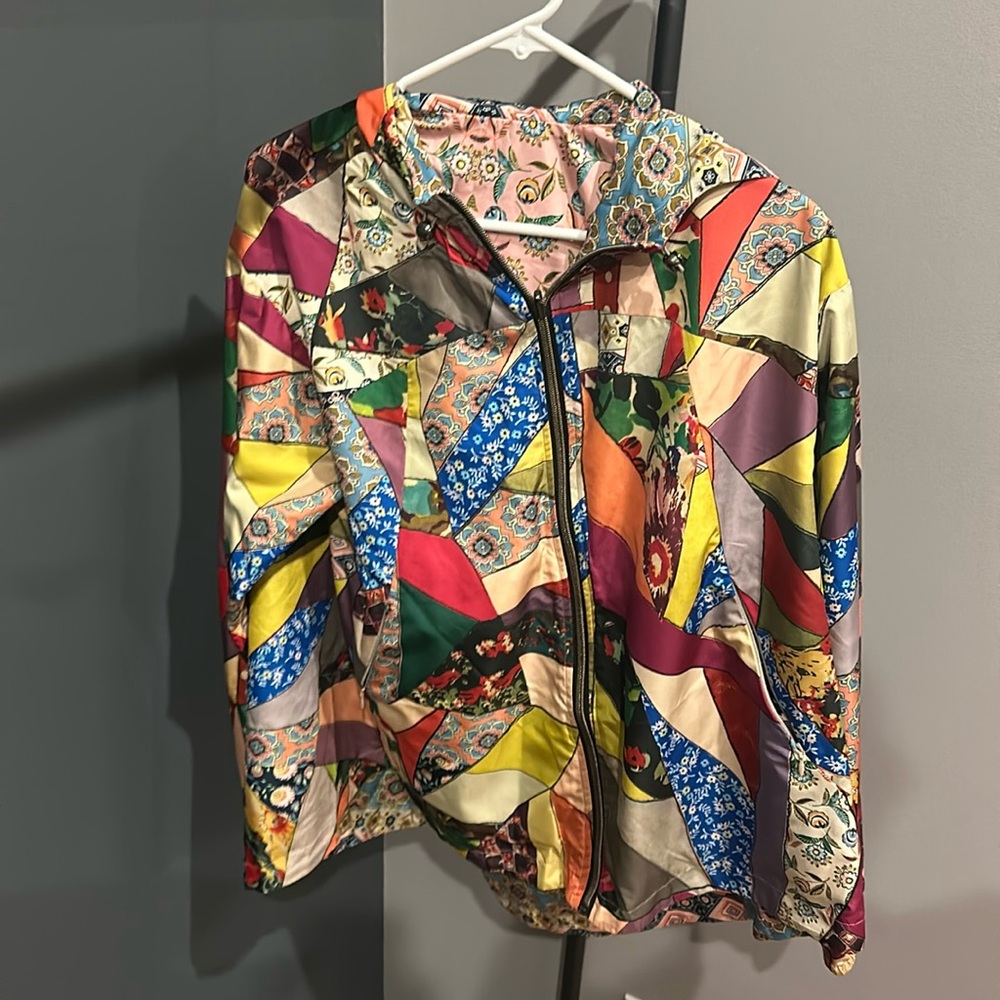 Johnny was reversible rain jacket/ wind breaker